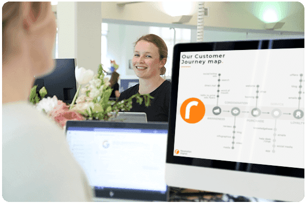 full_service_performance_marketing_as_a_service_woman_looking_at_customer_journey_roi