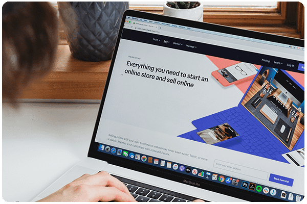 cro_person_laptop_opens_landing_page_to_purchase_shopping