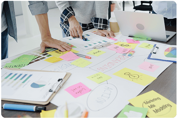 marketing_mix_modelling_team_planning_sticky_notes